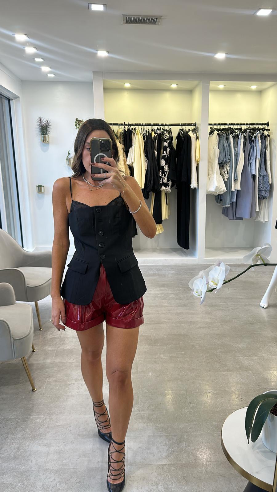 Red pattern leather shorts